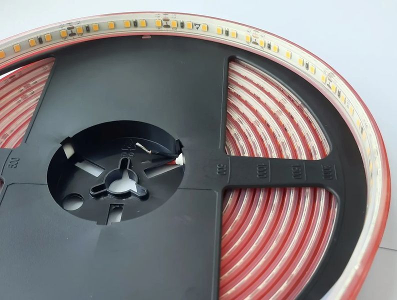 Led стрічка герметична COLORS 120шт/м 24V 9,6Вт CRI=80 4000К ІР67 з кратністю різу 50мм DJ120-24V-8mm-IP67-NW фото